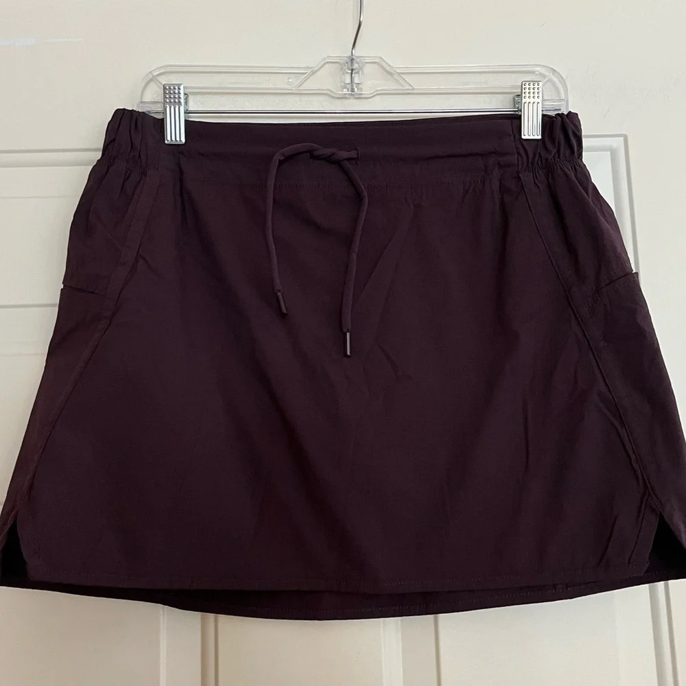 Women’s Te Verde dark purple active tennis pickleball skirt with pockets.Medium